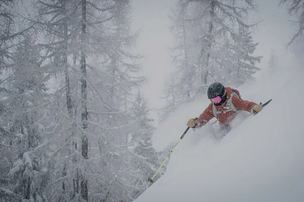 A skier on a snowy slope